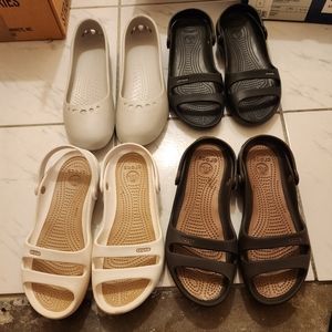 4 pair of crocs